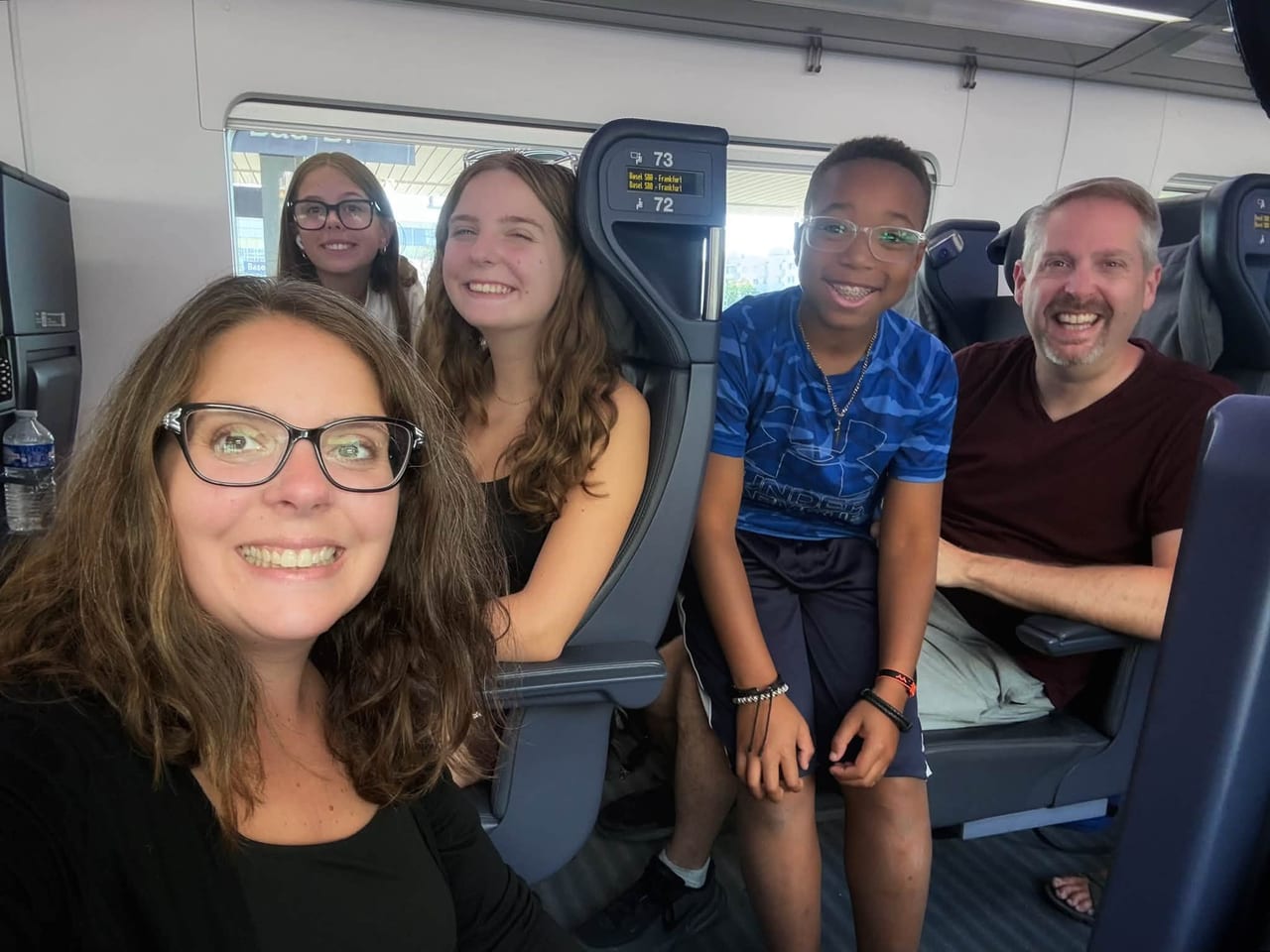 The Wilson family together on the train to Frankfurt