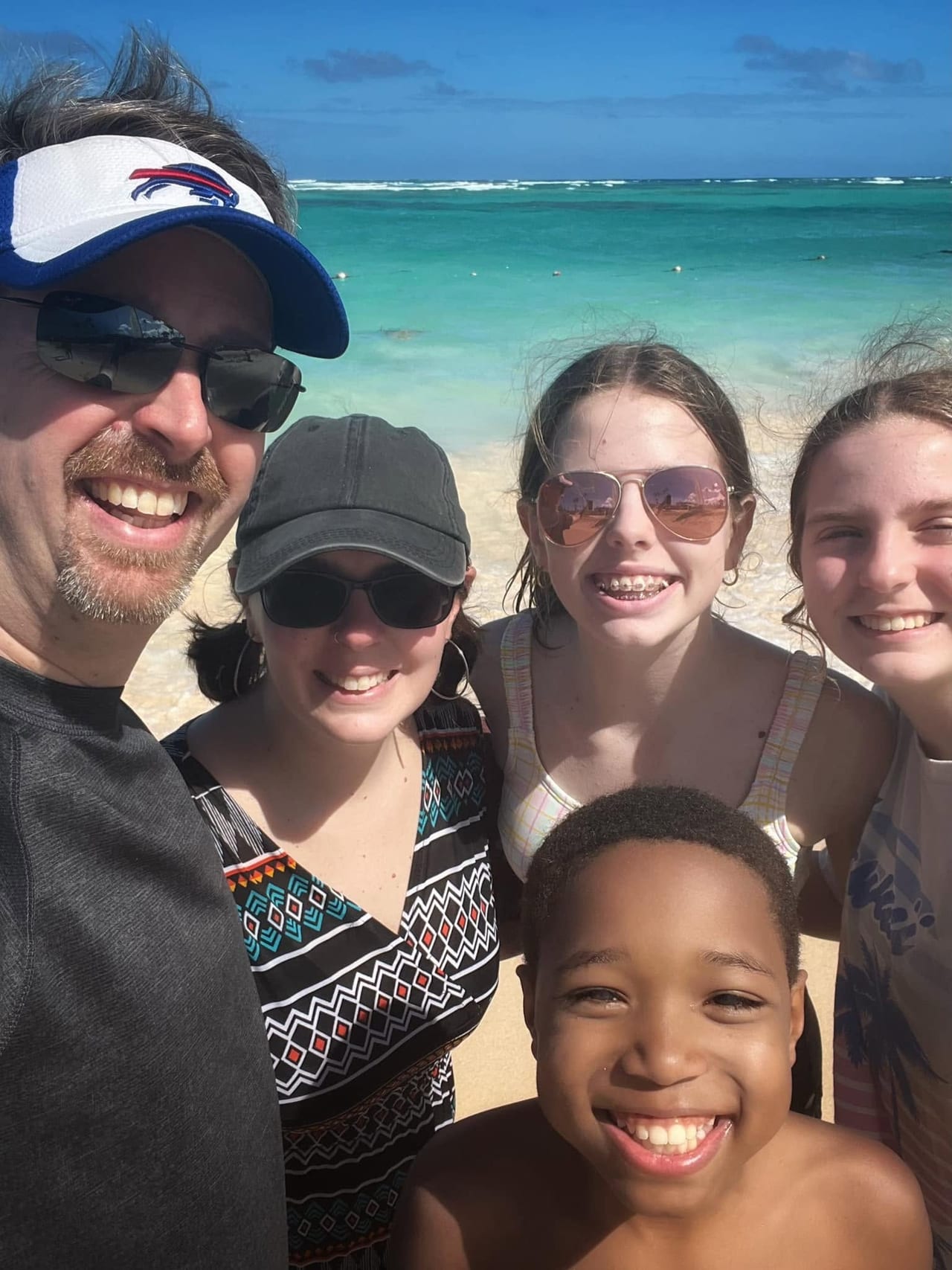 The Wilson family together on the beach in the Dominican Republic